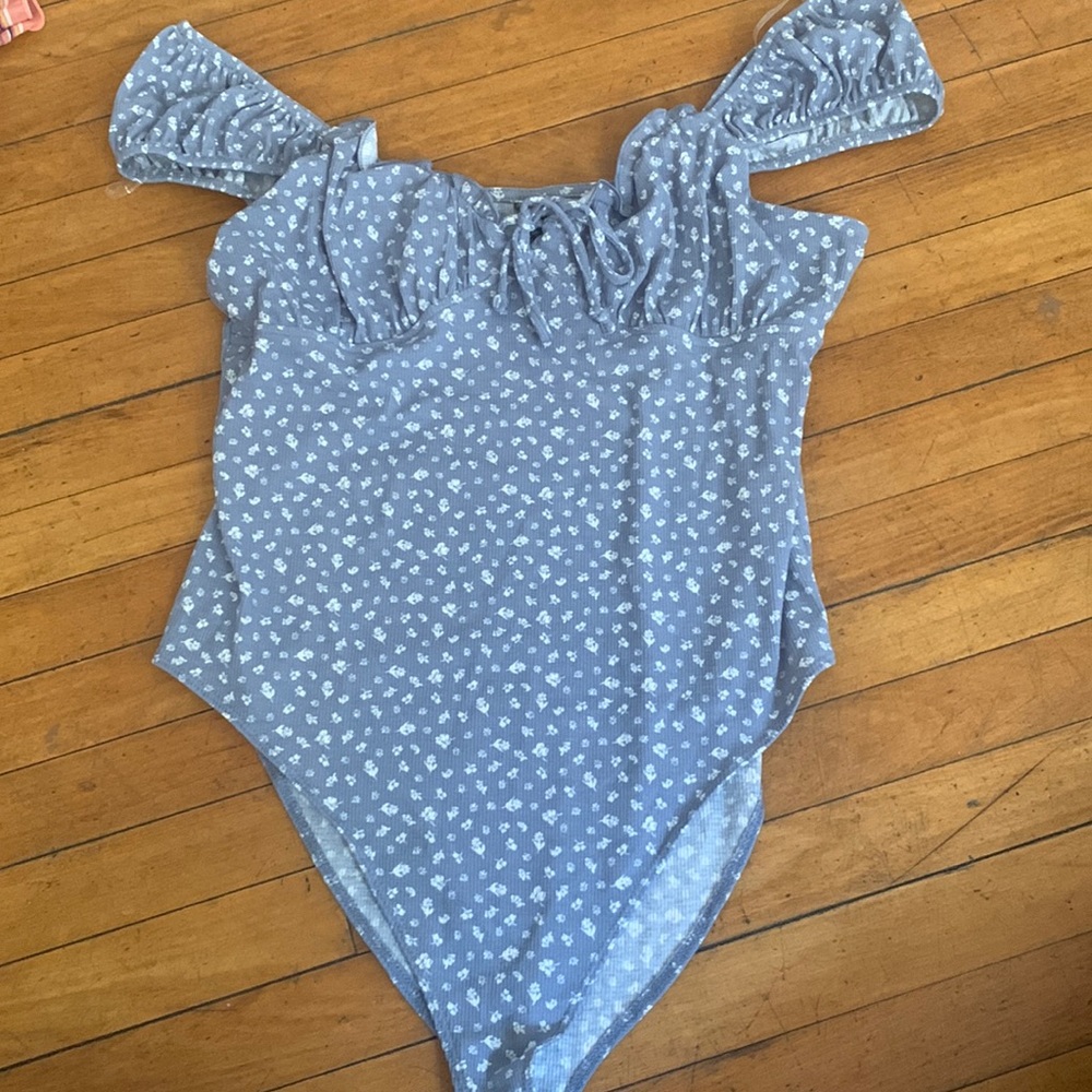 Blue body suit
